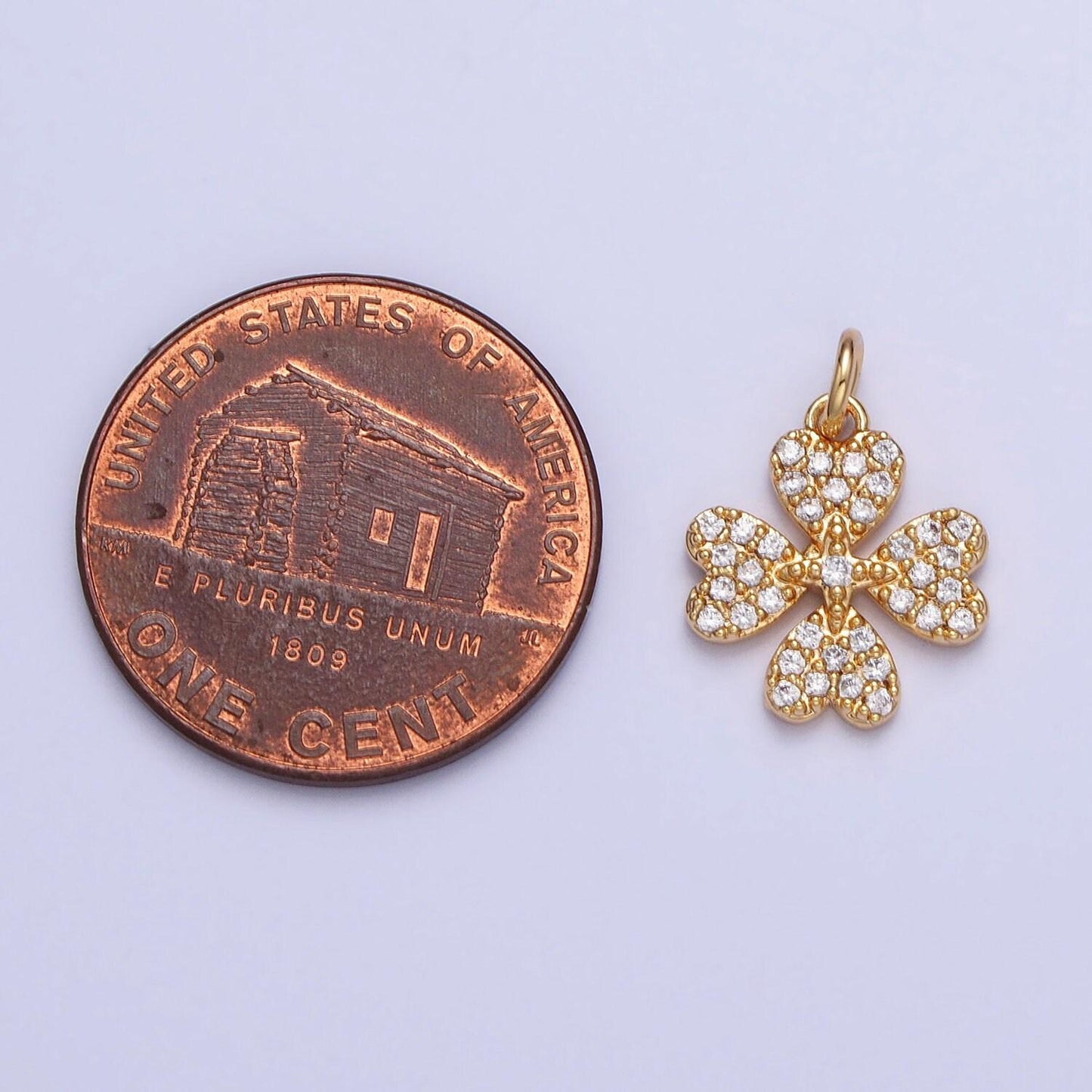Mini gold quatrefoil clover charm gold plated over brass lead nickel free micro pave cz quatrefoil four-leaf clover lucky pendant ac769