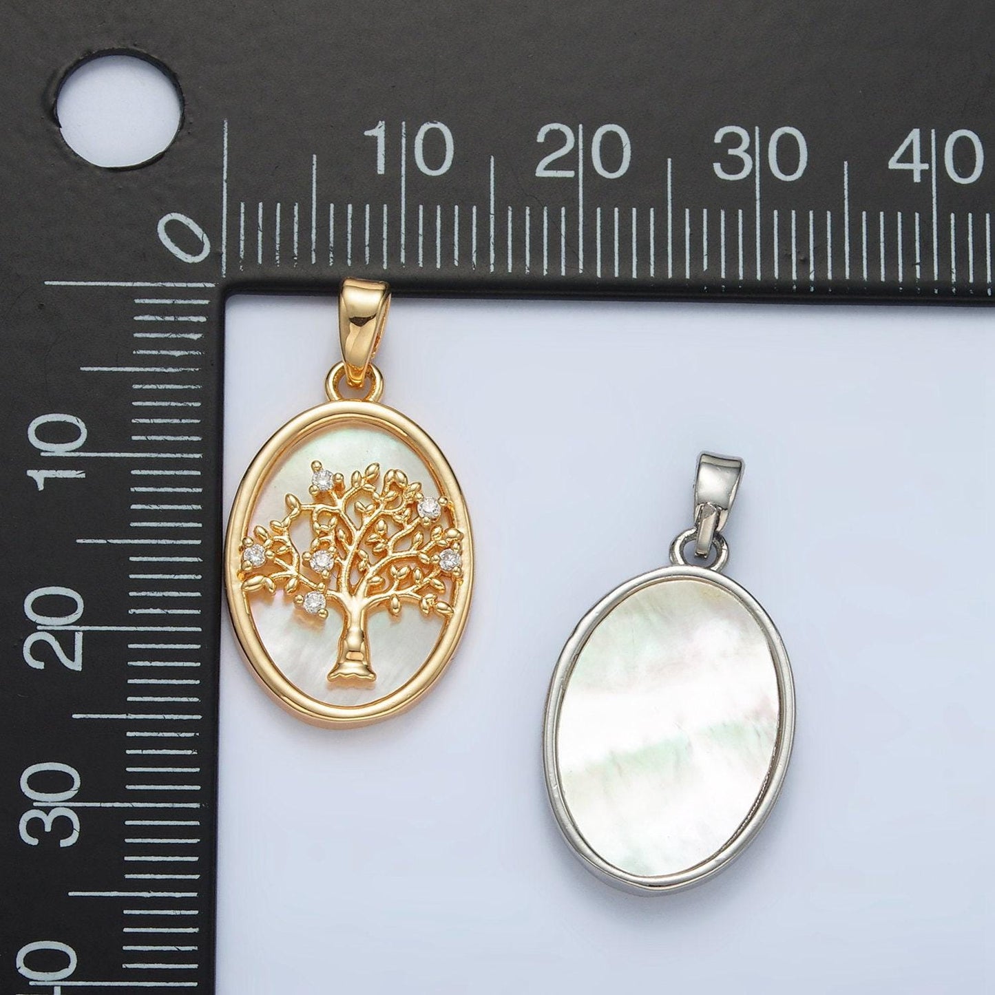 Gold filled shell pearl oval pendant with a cz tree design in gold & silver | aa1525