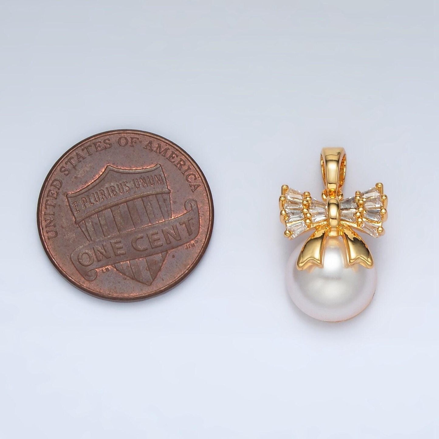 Mini gold baguette bow charm with faux pearl charm aa1408