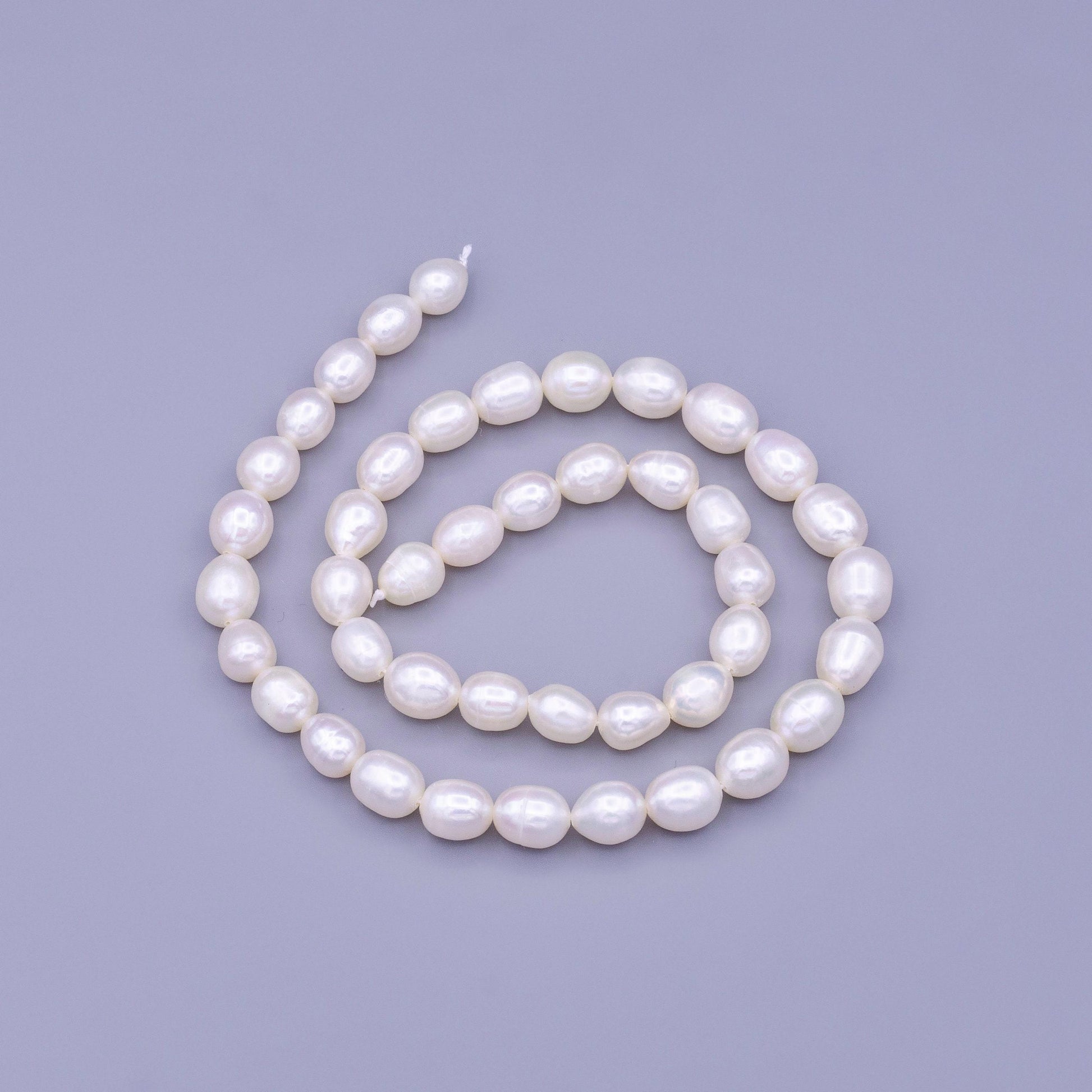 Aaa pearls beads genuine freshwater pearl 7.3mm potato oval rice pearl white per strand wholesale loose pearl by strand - wa-1666