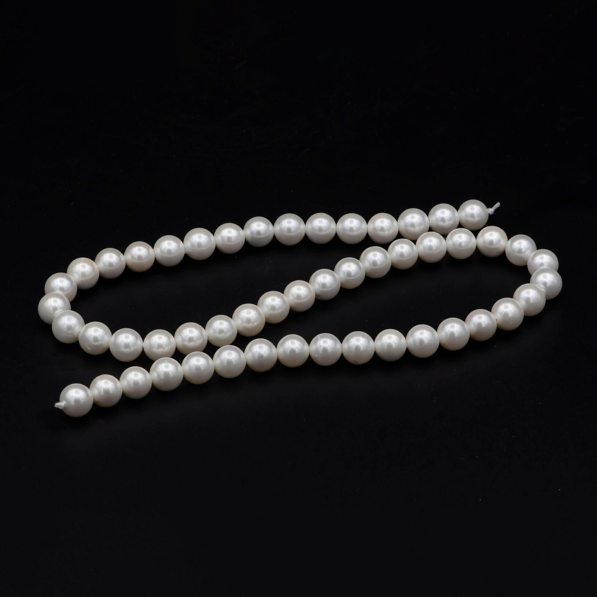 Wholesale 7.9-8.2mm white semi round mother of pearls, high luster smooth and round white mother of pearl beads | wa-575