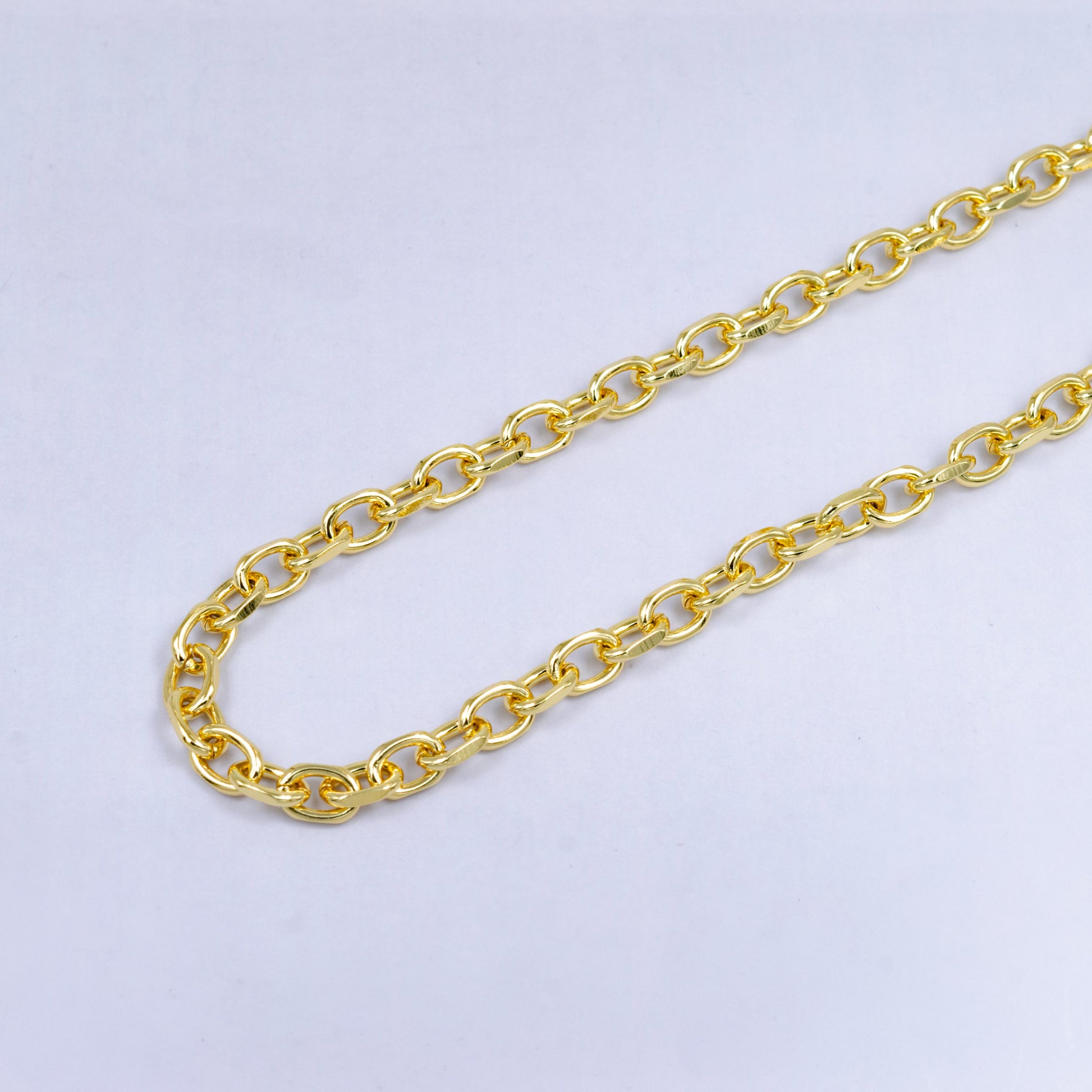 24k gold plated small paperclip chain by yard, gold oval link, wholesale bulk roll chain for jewelry making, size 10.5mm x 7.1mm x 1.8mm