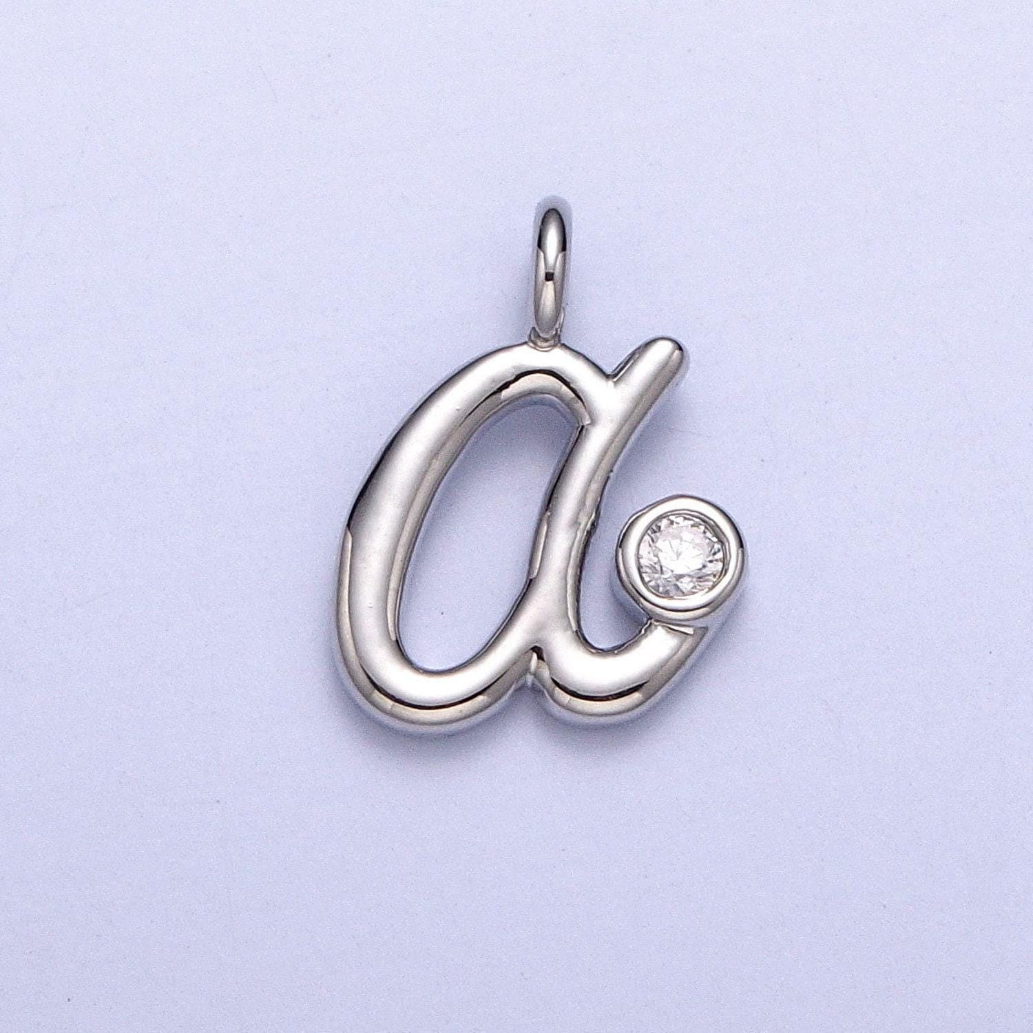 Dainty silver lower case initial letter alphabet charm pendant small cursive charm font simple minimalist personalized jewelry