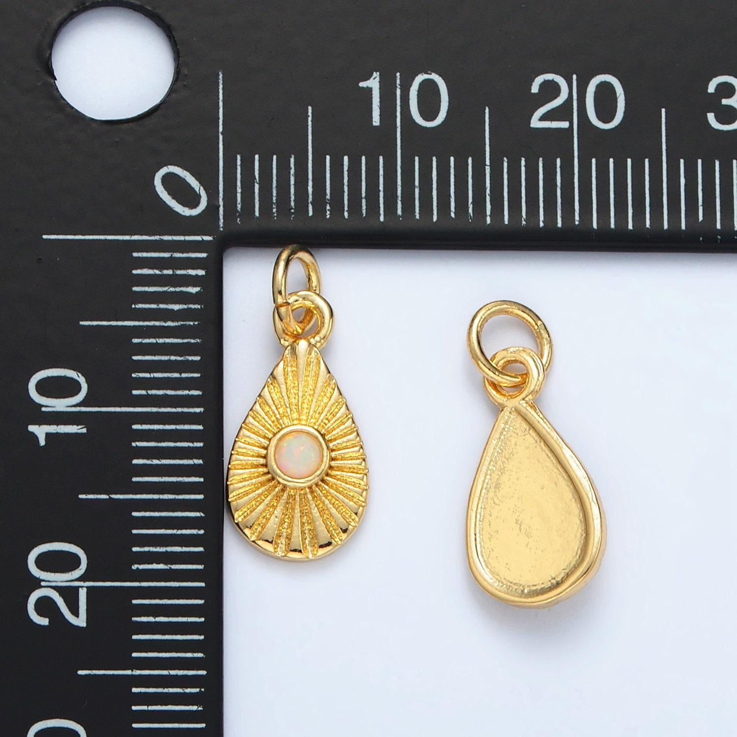 Gold filled sunburst teardrop with white opal charm | ag-857
