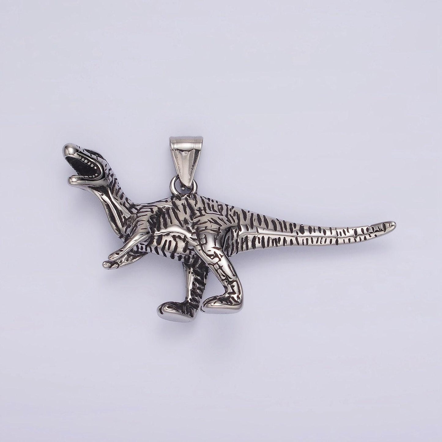 Stainless steel raptor, carnivore dinosaur pendant | p-1193