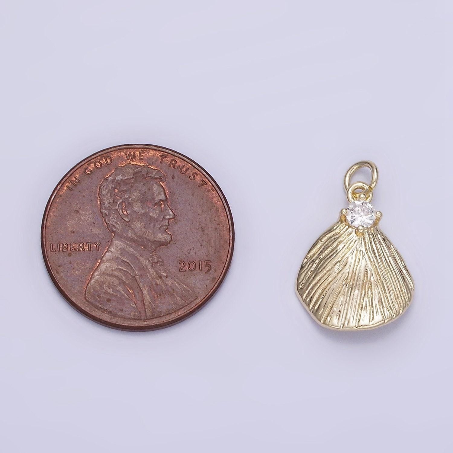 Mini gold textured ocean clam shell charm | ag728