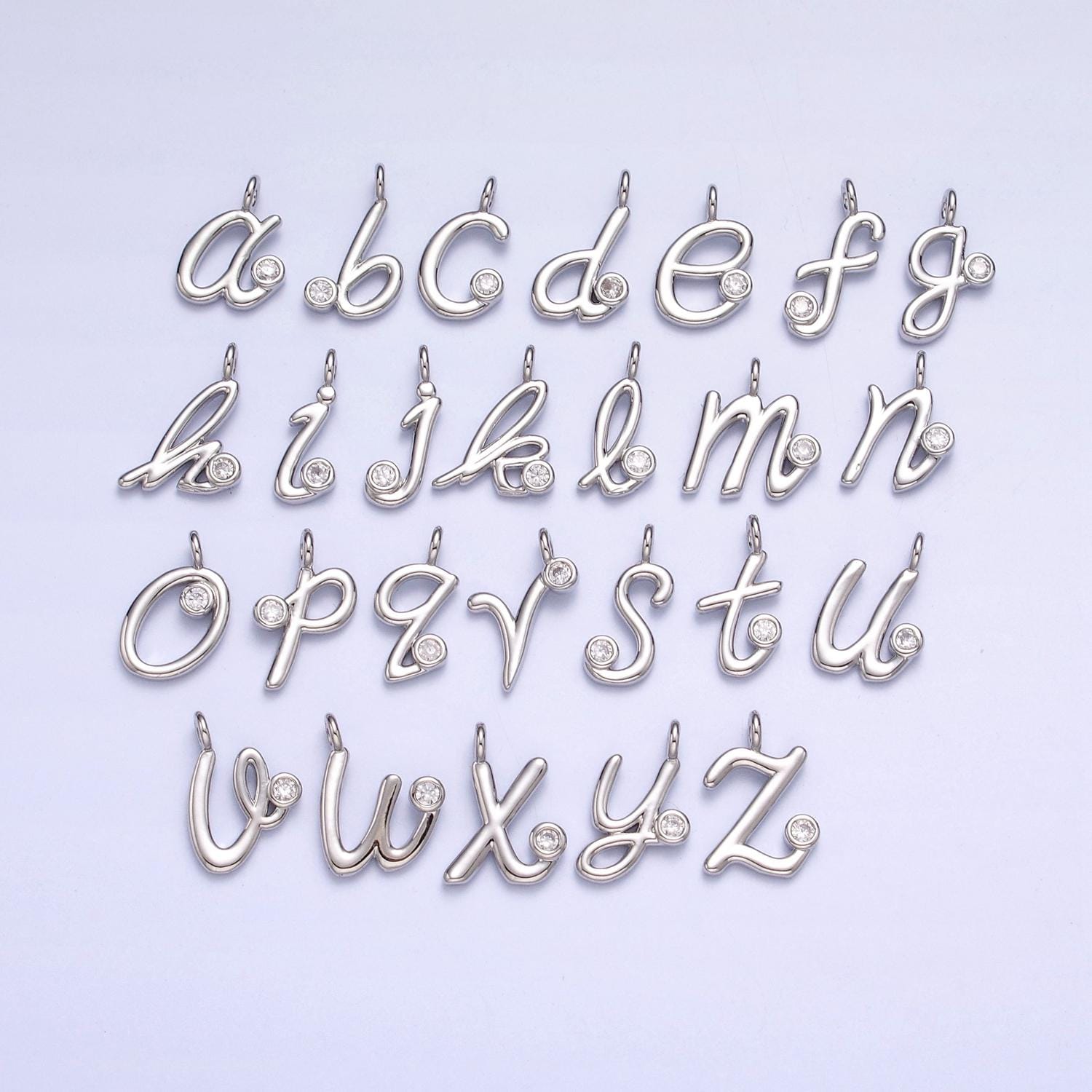Dainty silver lower case initial letter alphabet charm pendant small cursive charm font simple minimalist personalized jewelry