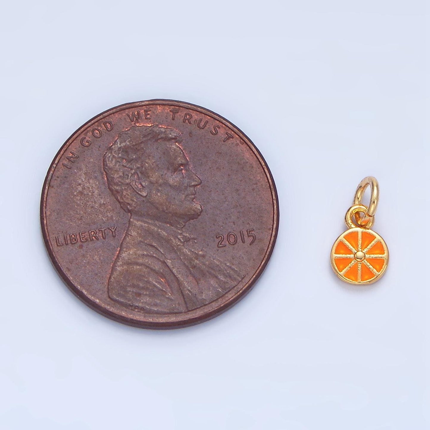 Tiny kumquat orange slice 24k gold filled enamel charm | x-830