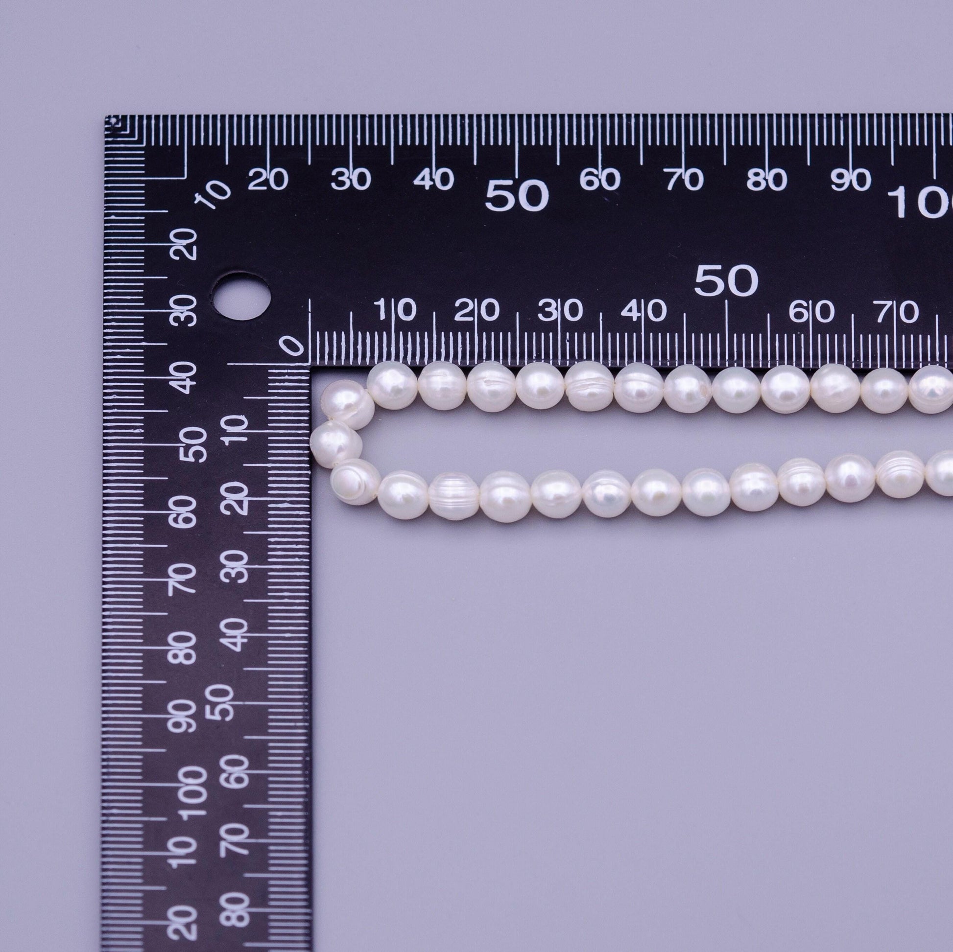 High quality grade aaa natural freshwater potato oval nugget keshi pearl beads - white 7mm wholesale pearl by strand wa1320