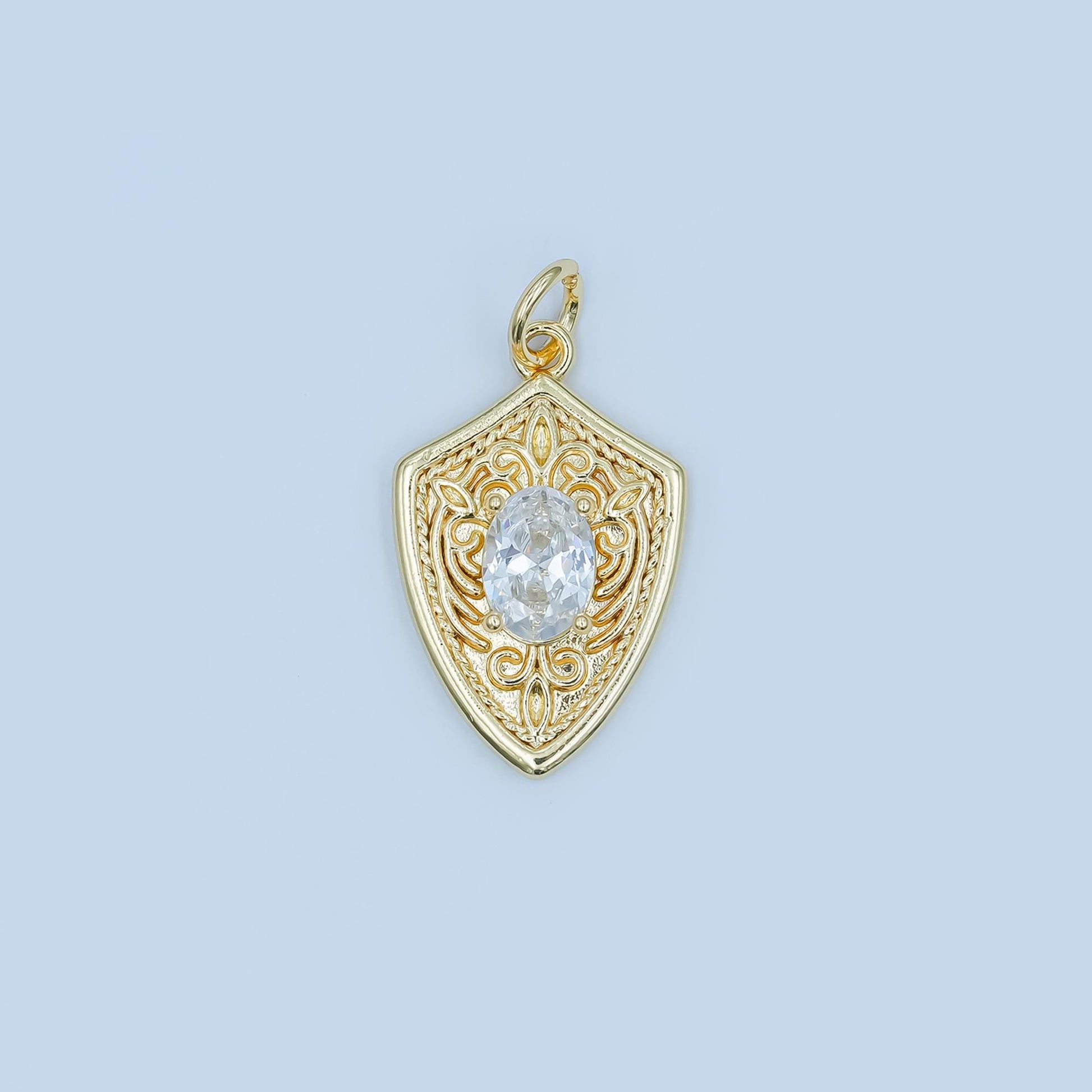 Shield Pendant Charm in Gold or Silver with Intricate Filigree and Crystal Center Medieval Inspired Necklace Charm Unique Statement Jewelry