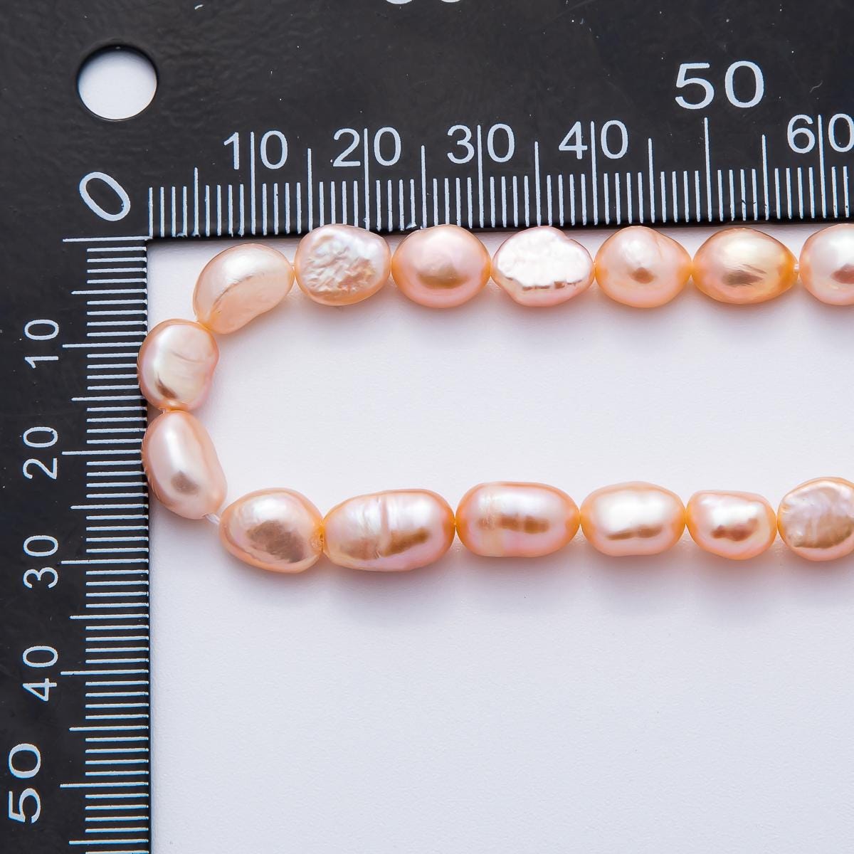 7.5mm Mauve Pink Rice Oval Freshwater Pearl Beads Genuine Mauve Pink Rice Freshwater Pearls WA-3501