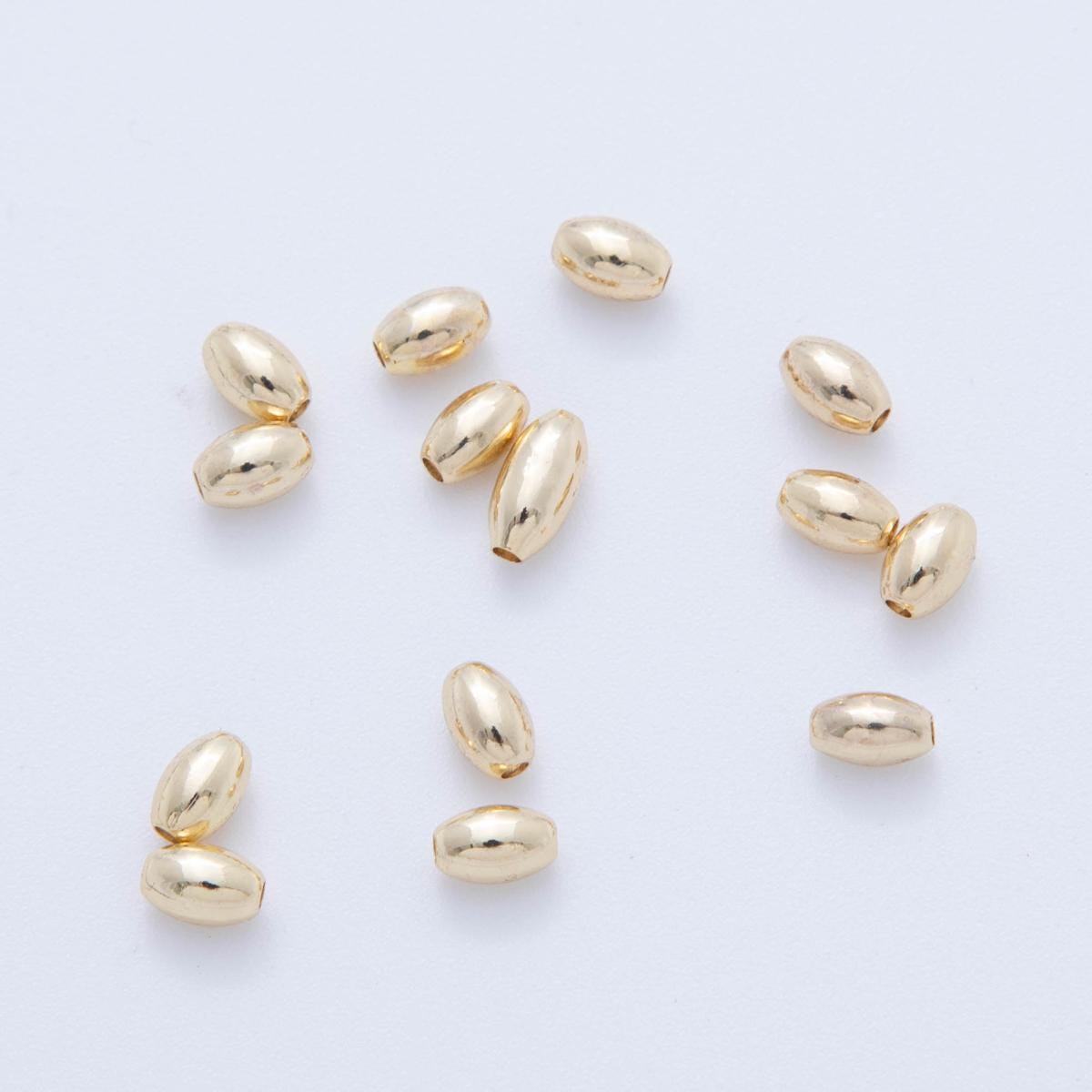10x 18k gold Filled Tiny Oval Bean spacer beads Tiny Seed Bead spacer beads 6x4 mm beads AF-1083