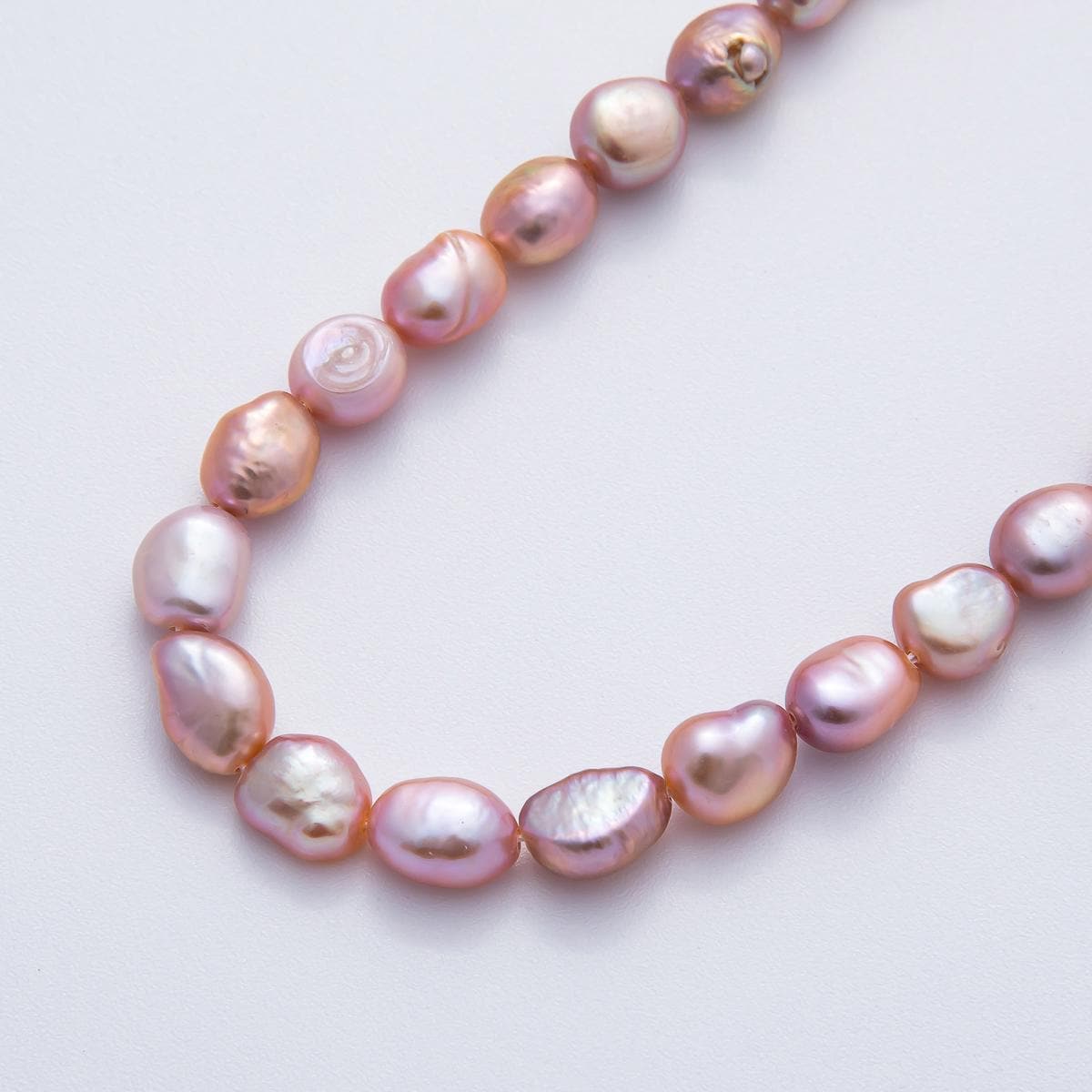 7.5mm Mauve Pink Rice Oval Freshwater Pearl Beads Genuine Mauve Pink Rice Freshwater Pearls WA-3501