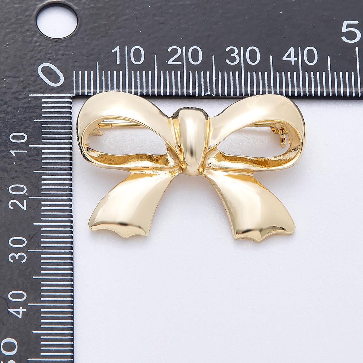 Gold 39mm x 25.7mm Minimalist Ribbon Bow Brooch Elegant Accessory for any occasion for coats bags and scarves statement pin | BH-100